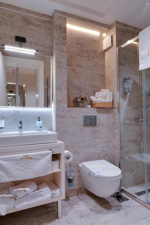 Private bathroom with a shower